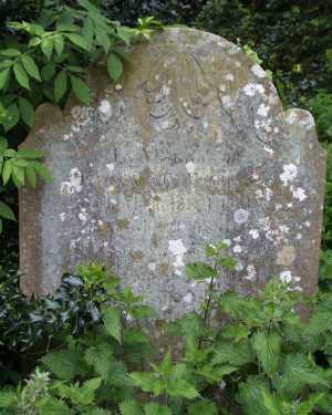 A headstone in Acton Churchyard