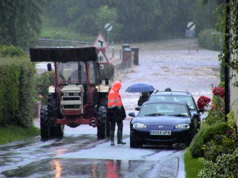 Batchelor's Bridge under pressure from flood water on 20 July 2007. Photo © 2007 Keith Bramich