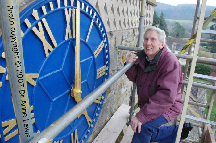 Ivor Bramich and the newly repainted and gilded clock face at Suckley Church. Photo copyright © 2007 Dr Anne Lewis